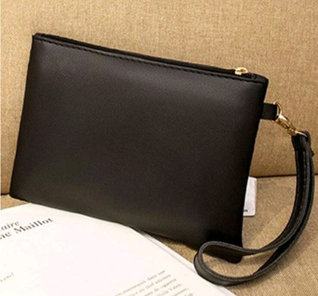 Sleek, simple, and stylish  Wristlet